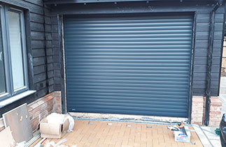 A Sws Seceuroglide Excel Insulated Roller Shutter Garage Door in Anthracite Grey. Fitted in Banstead, Surrey