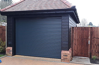 A Sws Seceuroglide Insulated Roller Shutter Garage Door in Anthracite Grey. Fitted in Banstead, Surrey