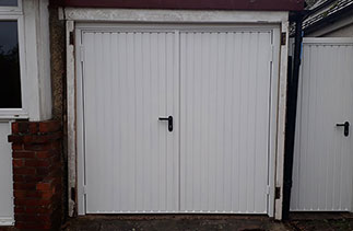 Before the White Pvc cladding was fitted to the existing timber frame and the Burgundy Fascia. Pvc work carried out by a Window company.