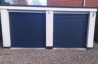 Two Sws Seceuroglide Excel insulated roller shutter garage doors in Anthracite Grey. Fitted in Camberley. Surrey