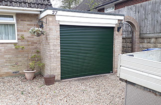 A Gliderol 55mm compact roller shutter garage door. Fitted in Farnham, Surrey.