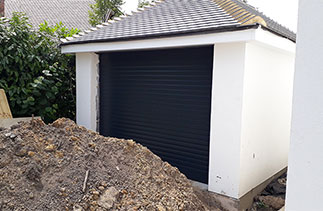 A Sws Seceuroglide Excel roller shutter garage door. Fitted in Woking, Surrey