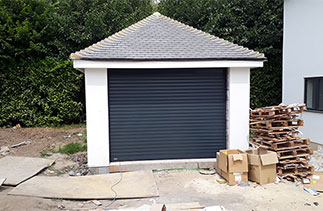 A Sws Seceuroglide Excel roller shutter garage door in Anthracite Grey. Fitted in Woking, Surrey