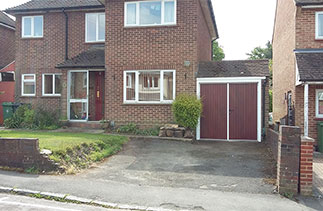 After the Installation of a set of Wessex GRP York side hinged garage doors. Fitted in Camberley, Surrey.