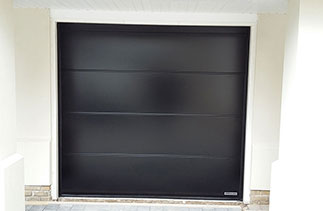 A up close picture of One of the Three sectional garage doors fitted in the previous picture. Fitted in Egham, Surrey.