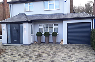 A Sws Seceuroglide Excel in Anthracite Grey fitted with matching guides and a matching full box. Garage door fitted in Ottershaw, Surrey.