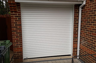 A Sws Seceuroglide Excel insulated roller shutter garage door fitted in Bagshot, Surrey