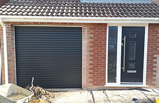 A Sws Seceuroglide Excel insulated, electronically operated roller shutter garage door in Anthracite. Fitted in Basingstoke, Hampshire.